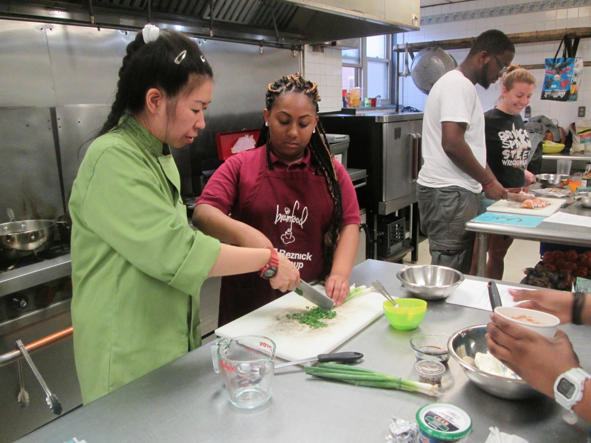 Chef Ztang demonstrating knife skills