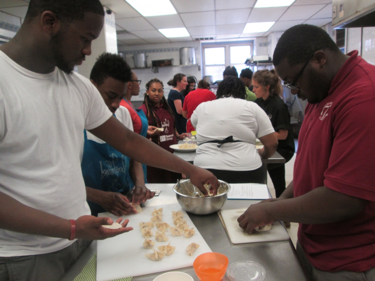 Teens preparing figs