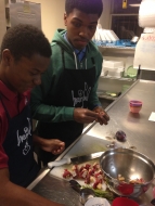 Assembling steak kabobs!