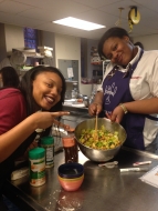 Brainfoodians prepping a Caesar Salad