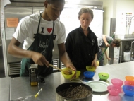 Carlos serving quinoa